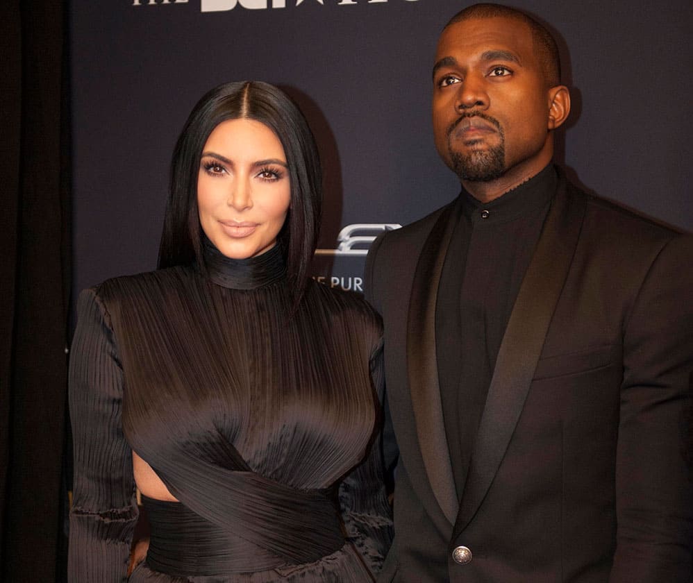 Kim Kardashian and Kanye West arrive on the red carpet at the BET Honors 2015 at Warner Theater in Washington.