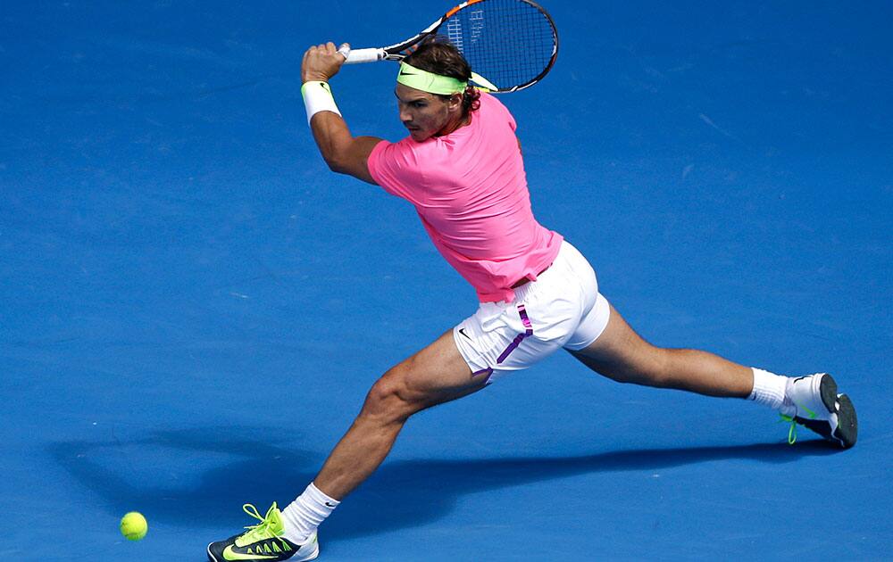 Rafael Nadal of Spain reaches for a shot to Kevin Anderson of South Africa during their fourth round match at the Australian Open tennis championship in Melbourne, Australia.