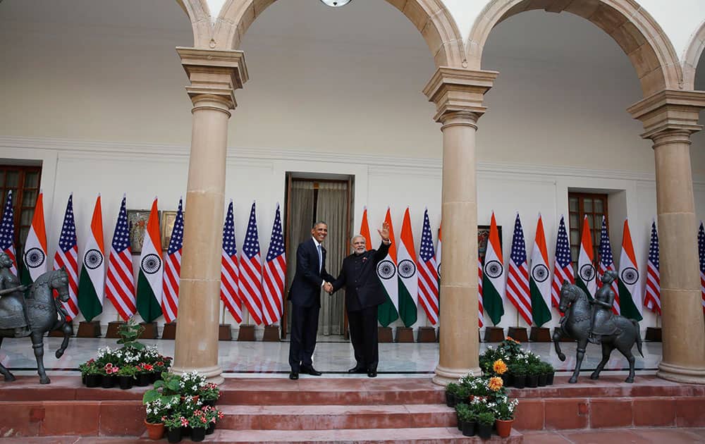 President Barack Obama shakes hand with Indian Prime Minister Narendra Modi before a meeting in New Delhi, India.