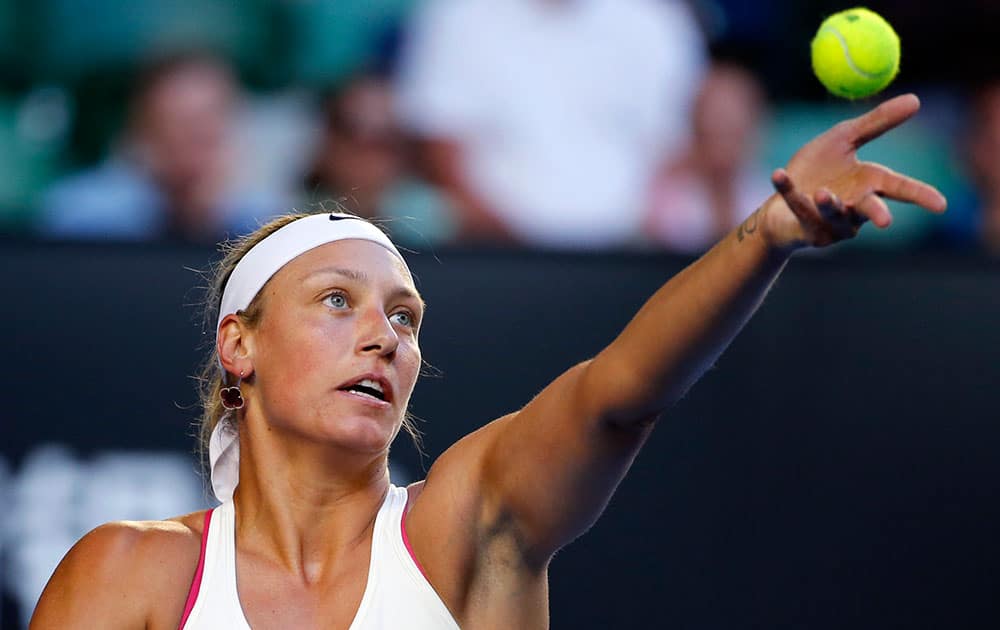 Yanina Wickmayer of Belgium serves to Simona Halep of Romania during their fourth round match at the Australian Open tennis championship in Melbourne, Australia.