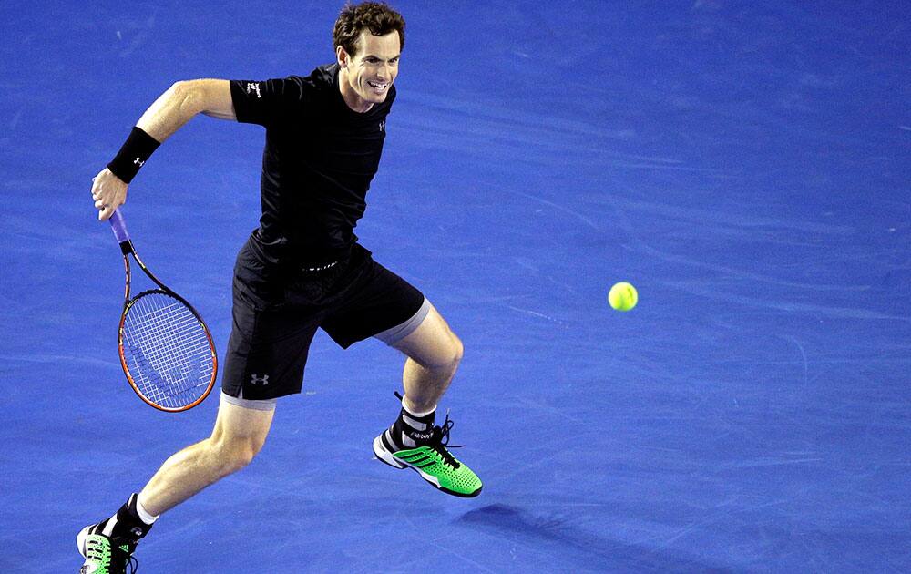 Andy Murray of Britain plays a shot to Grigor Dimitrov of Bulgaria during their fourth round match at the Australian Open tennis championship in Melbourne, Australia, Sunday.