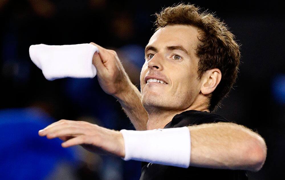 Andy Murray of Britain throws a wristband to the crowd after defeating Grigor Dimitrov of Bulgaria in their fourth round match at the Australian Open tennis championship in Melbourne, Australia.