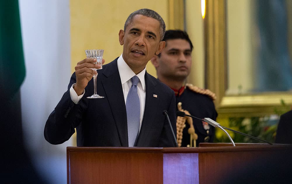 President Barack Obama delivers a toast a State Dinner hosted by Indian President Pranab Mukherjee at the Rashtrapati Bhavan, the presidential palace, in New Delhi.