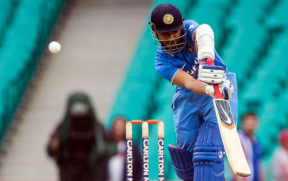 Ajinkya Rahane plays a thick outside edge from the bowling of Australian Josh Hazlewood during their one-day international cricket match in Sydney.