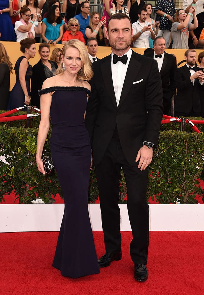 Naomi Watts, left, and Liev Schreiber arrive at the 21st annual Screen Actors Guild Awards at the Shrine Auditorium, in Los Angeles.