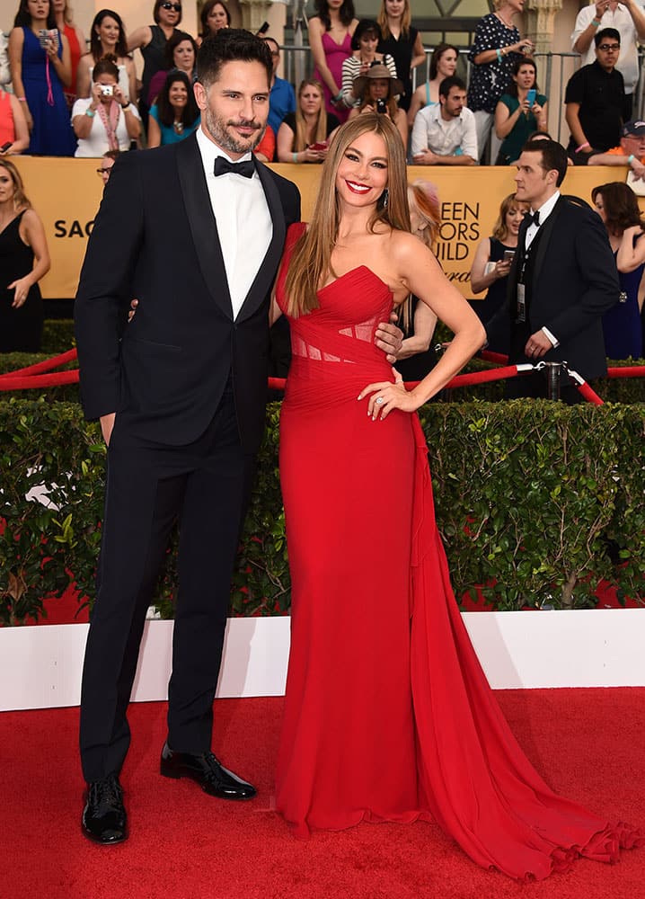 Joe Manganiello, left, and Sofia Vergara arrive at the 21st annual Screen Actors Guild Awards at the Shrine Auditorium, in Los Angeles.