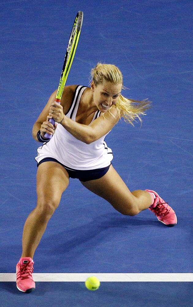 Dominika Cibulkova of Slovakia plays a shot to Victoria Azarenka of Belarus during their fourth round match at the Australian Open tennis championship in Melbourne, Australia.