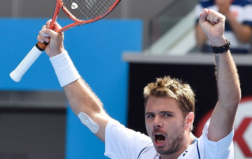 Stan Wawrinka of Switzerland celebrates after defeating Guillermo Garcia-Lopez of Spain in their fourth round match at the Australian Open tennis championship in Melbourne, Australia.