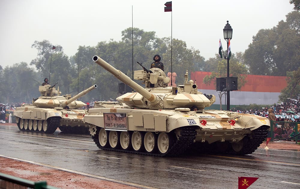 Tanks move along the Republic Day Parade route in New Delhi. President Barack Obama is the Chief Guest for this year's parade.