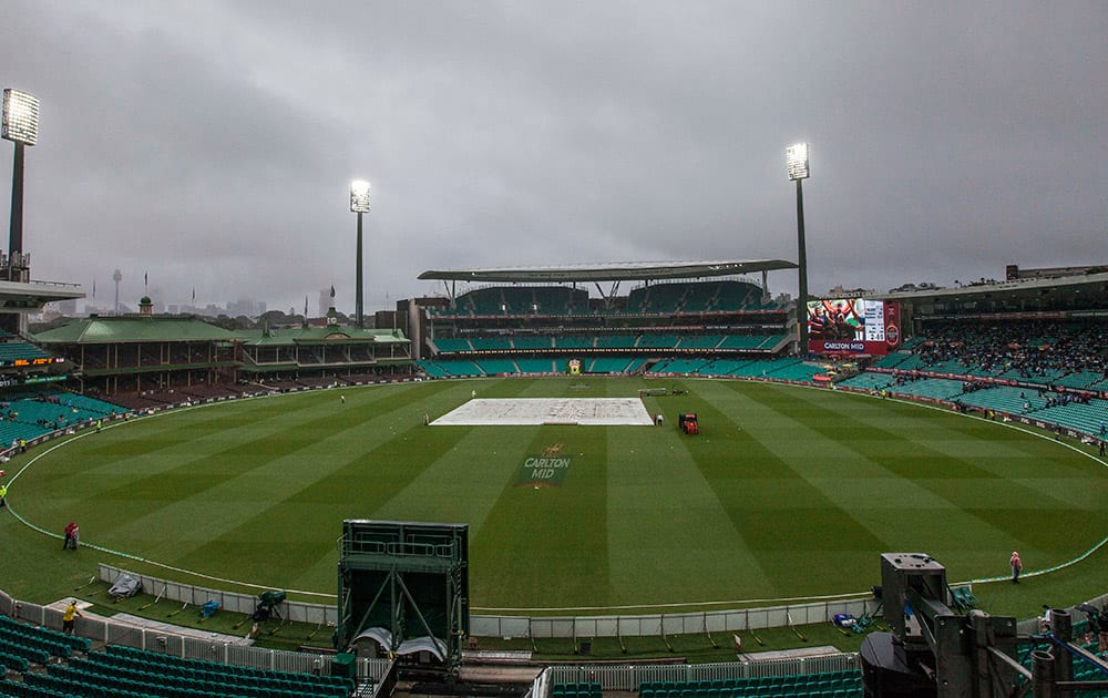 Rain delays play with India at 2 for 69 during their one day international cricket match in Sydney.