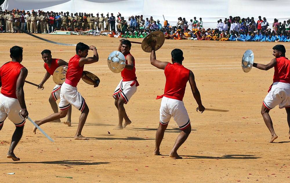 Indian Army soldiers perform Kalaripayattu, a traditional Indian martial art, during Republic Day celebrations in Bangalore, India, Monday.