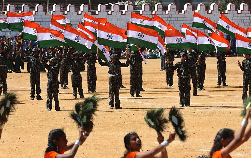 Indian school children perform during Republic Day celebrations in Bangalore, India, Monday.