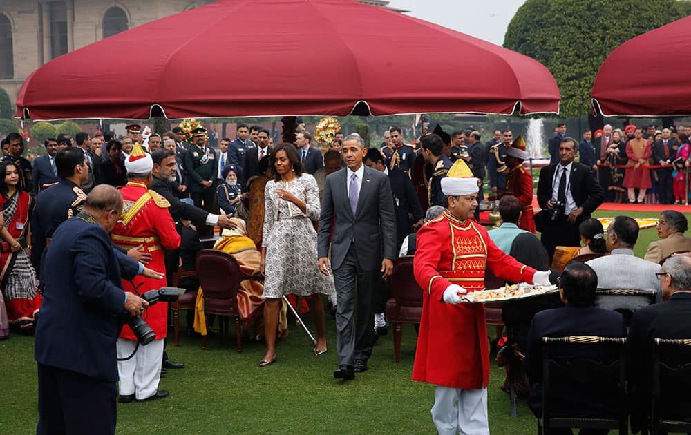 US President Barack Obama, along with first lady Michelle Obama arrives for a photo op during a reception hosted by President Pranab Mukherjee on India's Republic Day at the presidential palace in New Delhi.