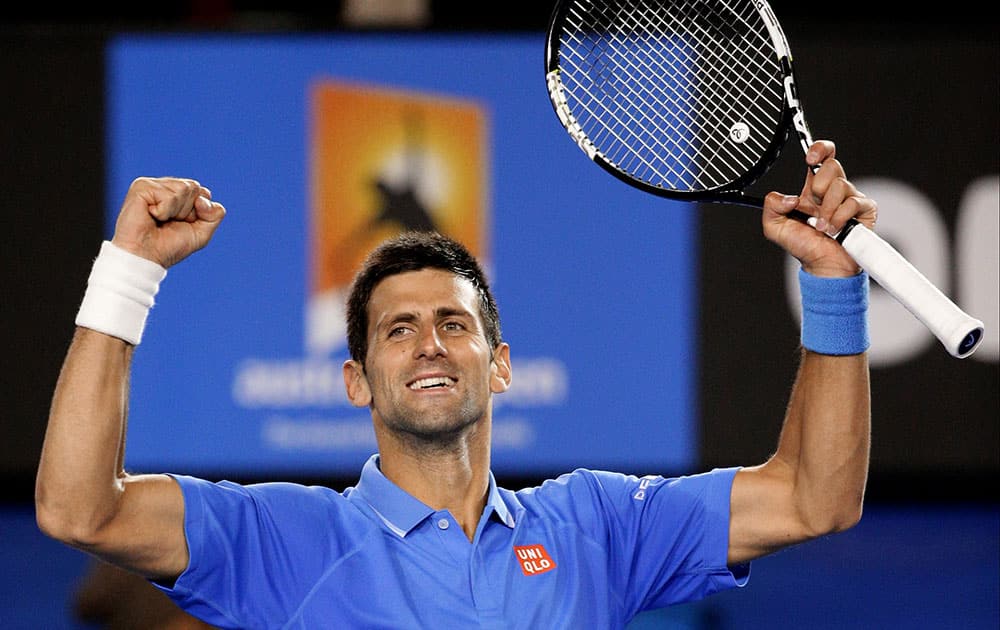 Novak Djokovic of Serbia celebrates after defeating Gilles Muller of Luxembourg in their fourth round match at the Australian Open tennis championship in Melbourne, Australia.