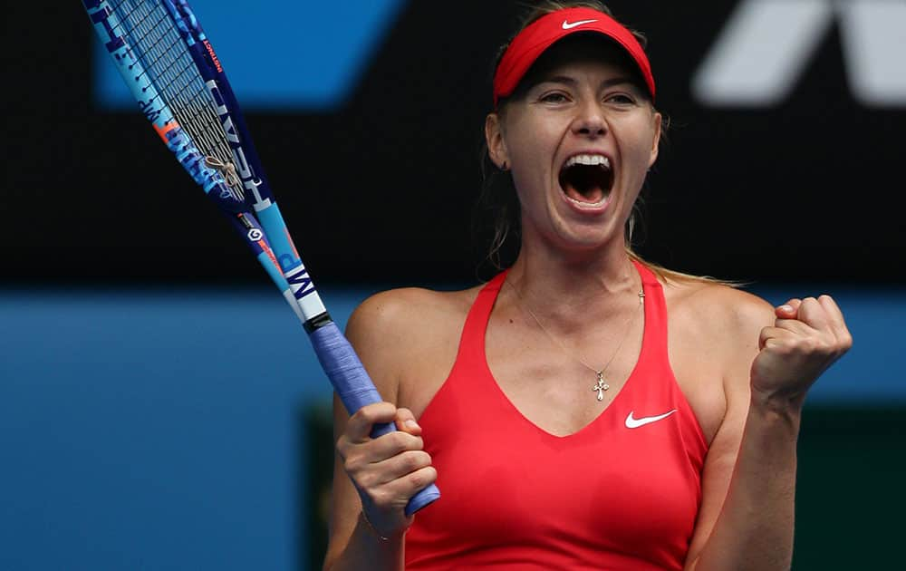 Maria Sharapova of Russia celebrates after defeating Eugenie Bouchard of Canada in their quarterfinal match at the Australian Open tennis championship.