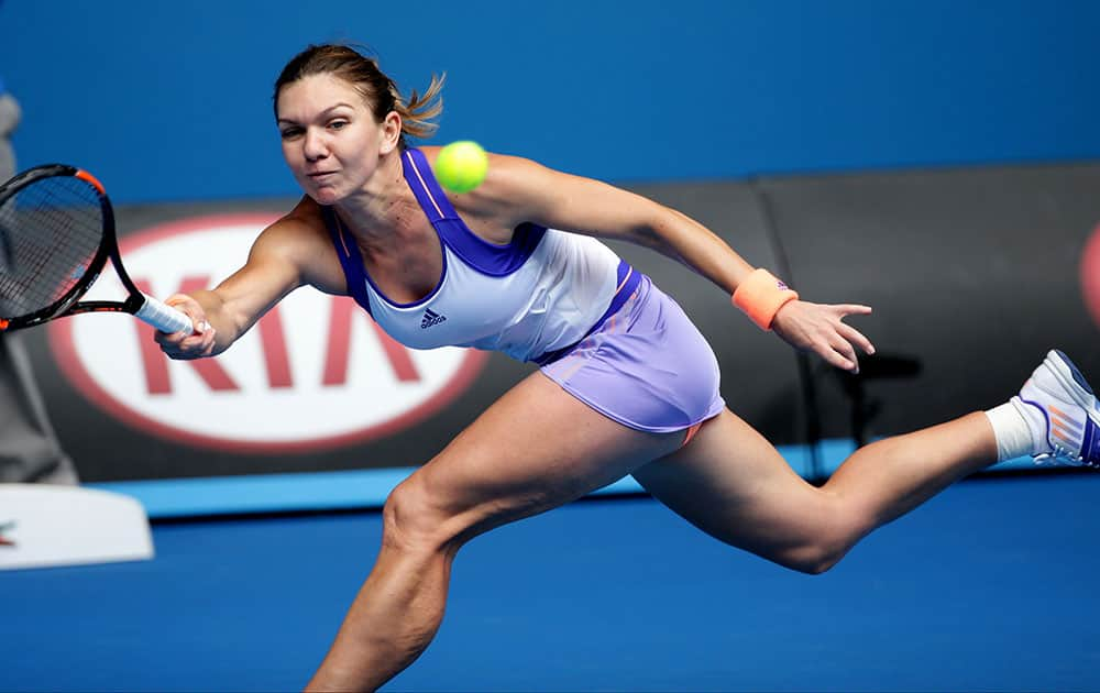 imona Halep of Romania reaches for a shot to Ekaterina Makarova of Russia during their quarterfinal match at the Australian Open tennis championship.