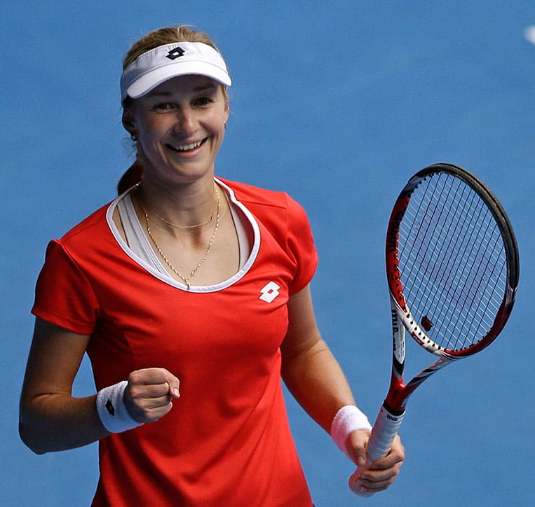 Ekaterina Makarova of Russia celebrates after defeating Simona Halep of Romania in their quarterfinal match at the Australian Open tennis championship.