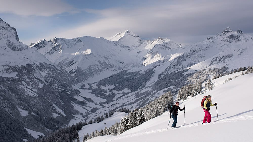 Backcountry skiers are on their way to the Fanenstock mountain (2,235 Meters above sea level), in Elm, eastern Switzerland.