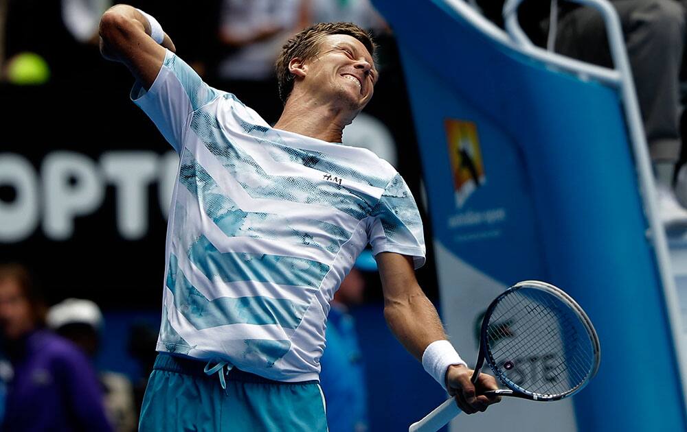 Tomas Berdych of the Czech Republic celebrates after defeating Rafael Nadal of Spain in their quarterfinal match at the Australian Open tennis championship in Melbourne, Australia.