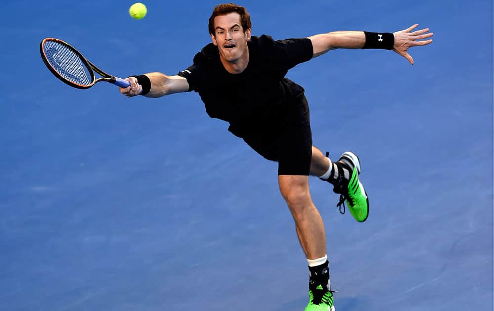 Andy Murray of Britain reaches out for a shot to Nick Kyrgios of Australia during their quarterfinal match at the Australian Open tennis championship in Melbourne, Australia.