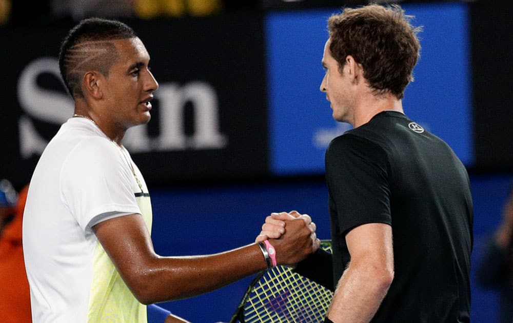 Andy Murray of Britain, right, is congratulated by Nick Kyrgios of Australia after winning their quarterfinal match at the Australian Open tennis championship in Melbourne, Australia.