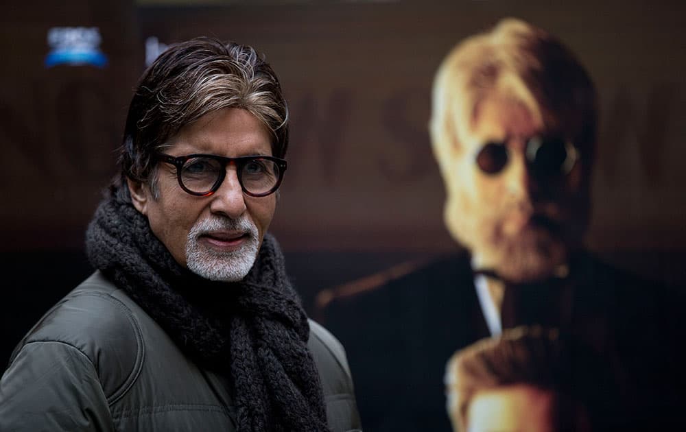 Indian actor Amitabh Bachchan poses for photographers during a photocall to promote the movie 