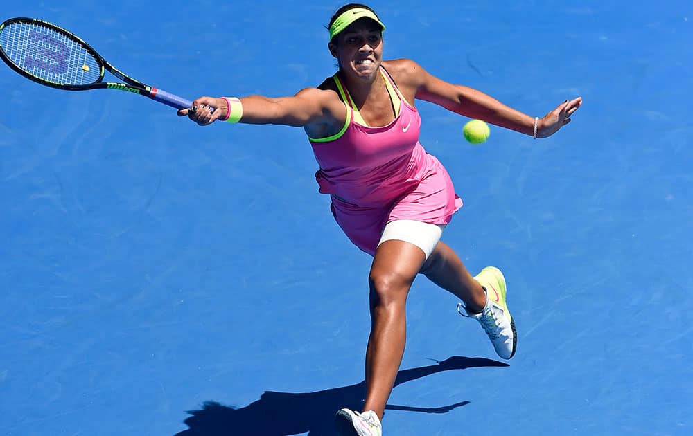 Madison Keys of the U.S. chases down a shot to her compatriot Venus Williams during their quarterfinal match at the Australian Open tennis championship.