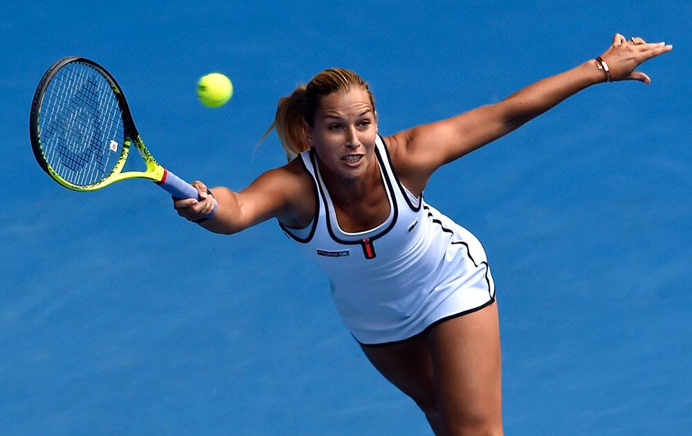 Dominika Cibulkova of Slovakia stretches out for a return to Serena Williams of the U.S. during their quarterfinal match at the Australian Open tennis championship.