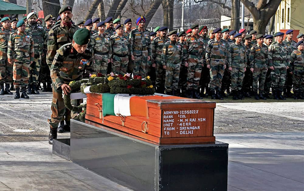 15 corps Commander Subrata Saha laying a wreath on the coffin of Col MN Rai at Badami Bagh headquarters in Srinagar.