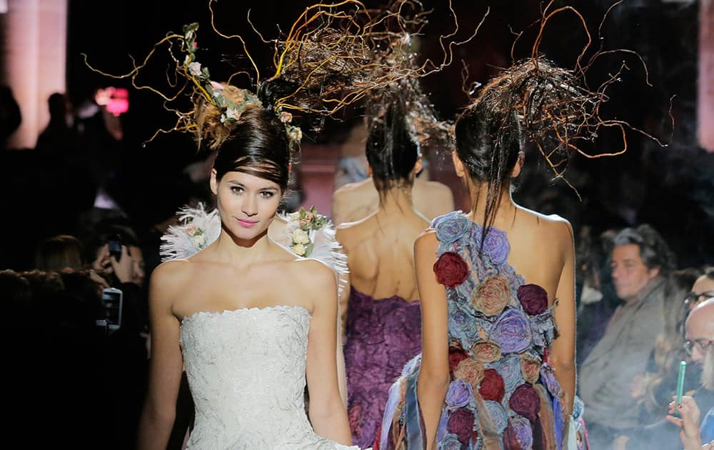 Models wear creations for Franck Sorbier's Spring-Summer 2015 Haute Couture fashion collection, presented in Paris, France.