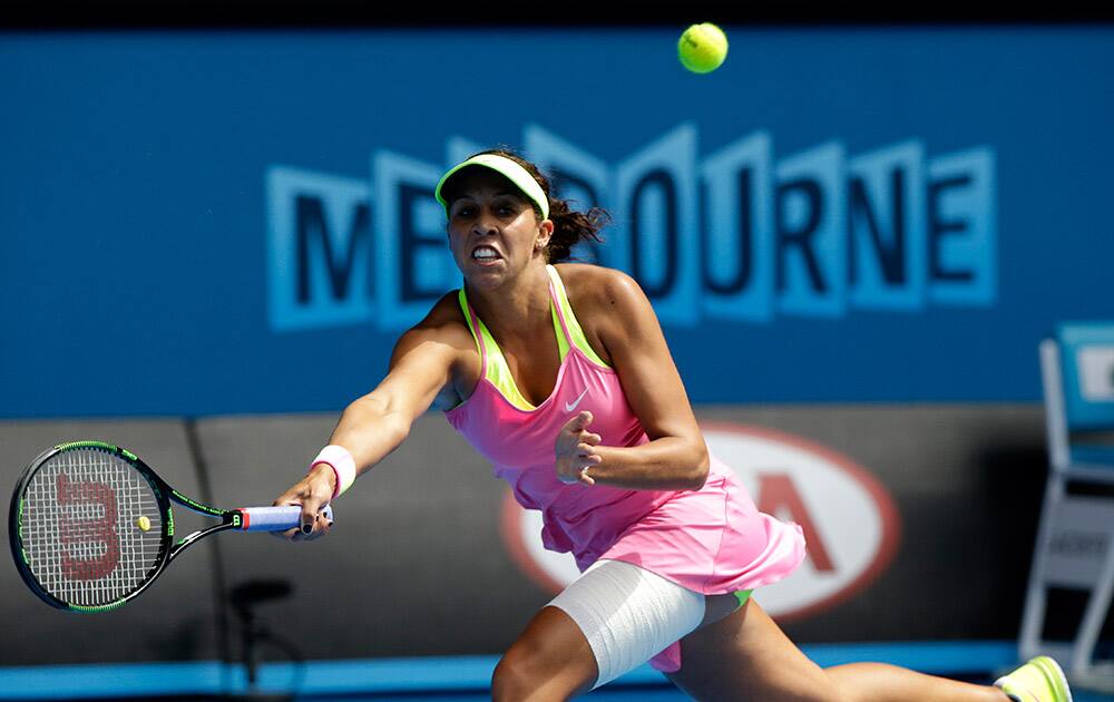 Madison Keys of the U.S. chases down a shot to her compatriot Serena Williams during their semifinal match at the Australian Open tennis championship in Melbourne, Australia.