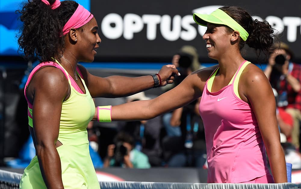 Serena Williams of the U.S., is congratulated by her compatriot Madison Keys after winning their semifinal match at the Australian Open tennis championship in Melbourne, Australia.