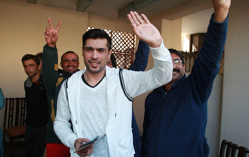 Pakistan fast bowler Mohammad Amir waves after a press conference in Lahore, Pakistan. The International Cricket Council allowed Amir to play in Pakistan's domestic cricket, easing out fast bowler's five-year ban which ends in September.