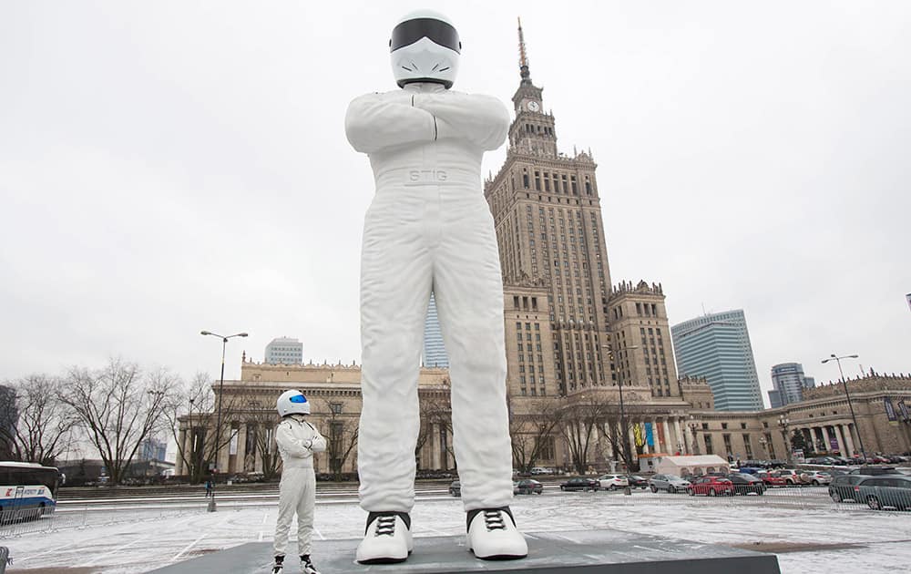 Top Gear’s The Stig, unveils a 10 metre high statue of himself, which has been created by BBC Worldwide, outside The Palace of Science and Culture in Warsaw, Poland to mark the launch of new global channel, BBC Brit which makes its debut on 1st February.