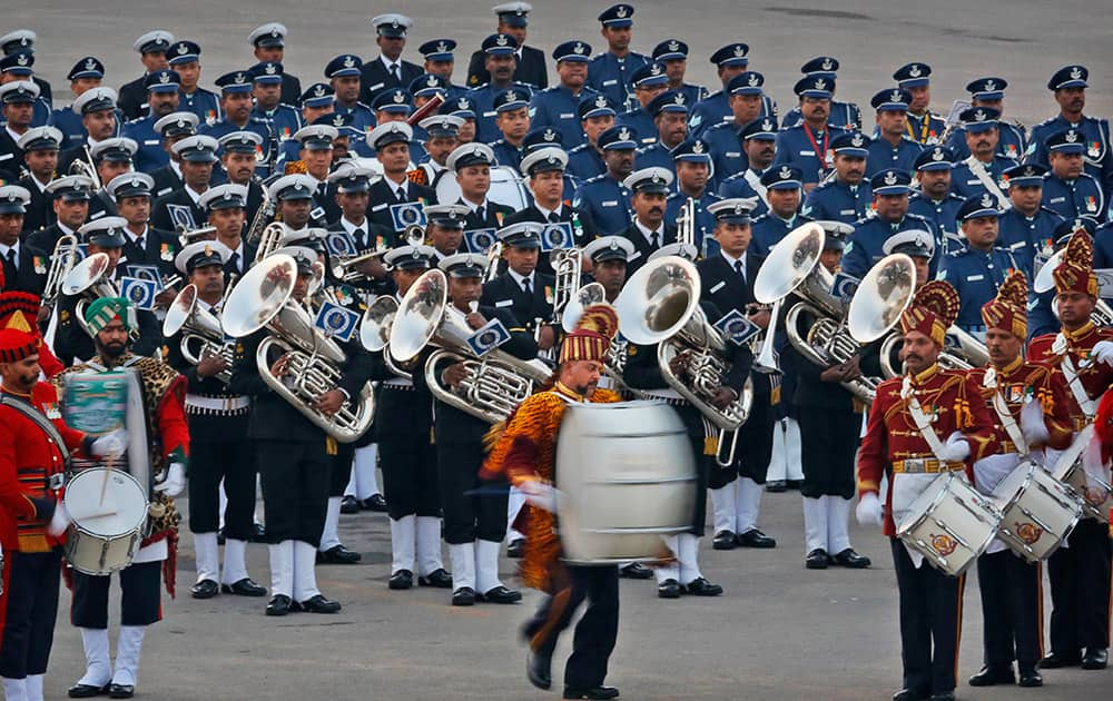 Bands from the three wings of Indian military perform during the Beating Retreat ceremony, in New Delhi.