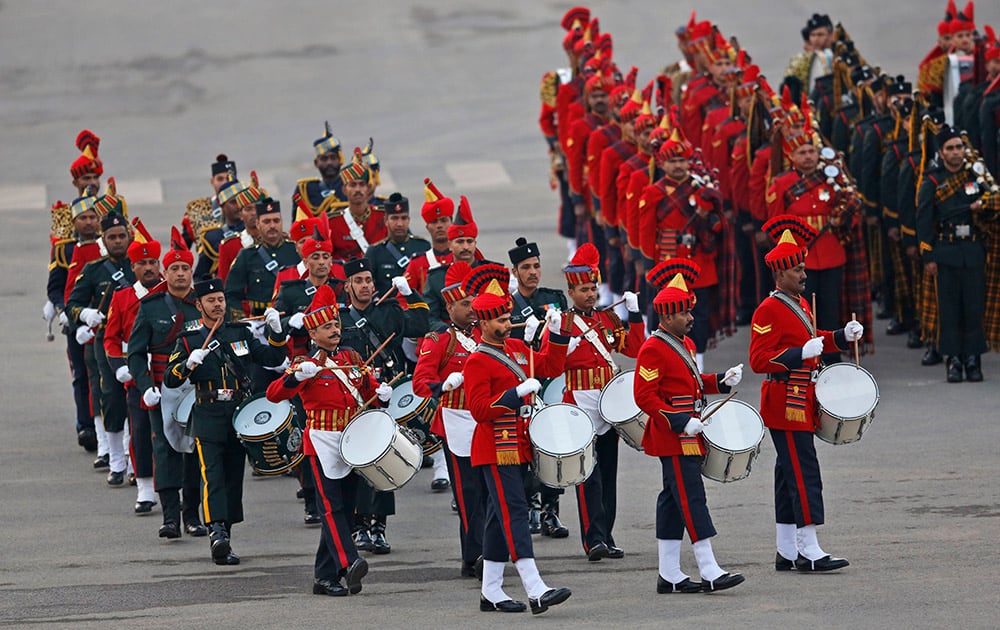 Bands from the three wings of Indian military perform during the Beating Retreat ceremony, in New Delhi.