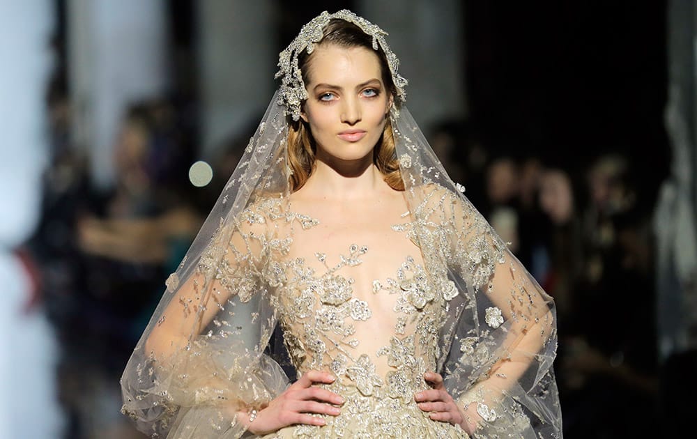 A model wears the wedding gown for Zuhair Murad's Spring-Summer 2015 Haute Couture fashion collection presented in Paris, France.