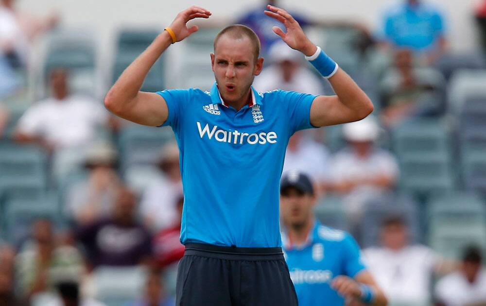 England's Stuart Broad reacts to a missed wicket during their one day international cricket match against India in Perth.