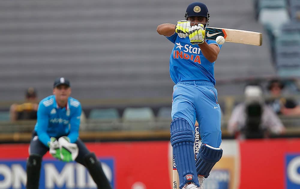 Ravindra Jadeja plays a pull shot during their one day international cricket match against England in Perth.