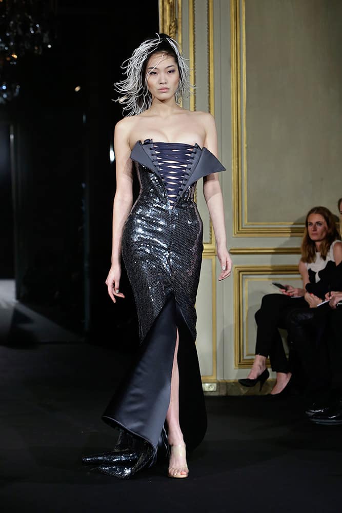 A model wears a creation by French designer Alexis Mabille as part of his Spring-Summer 2015 Haute Couture fashion collection, presented in Paris.