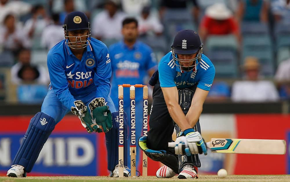 Jos Butler plays a stroke during England's one day international cricket match against India in Perth, Australia.