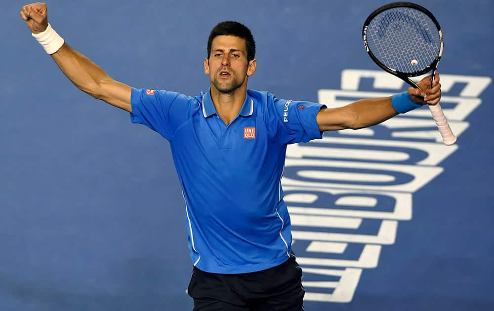 Novak Djokovic of Serbia celebrates after defeating Stan Wawrinka of Switzerland in their semifinal at the Australian Open tennis championship in Melbourne, Australia.