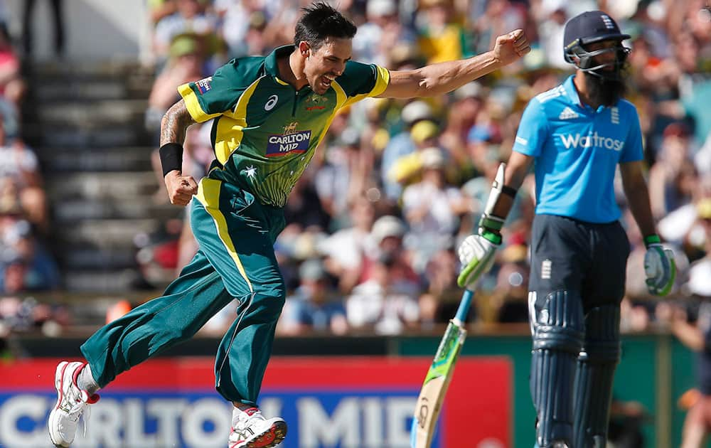 Australia's Mitchell Johnson celebrates after taking the wicket of England's James Taylor during their one day international cricket match in Perth, Australia.