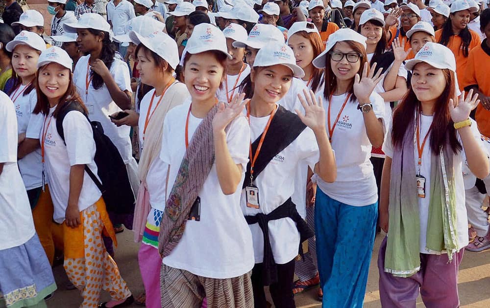 Particpants take part in a Cancer Awareness Walk in Saroornagar Indoor Stadium in Hyderabad.