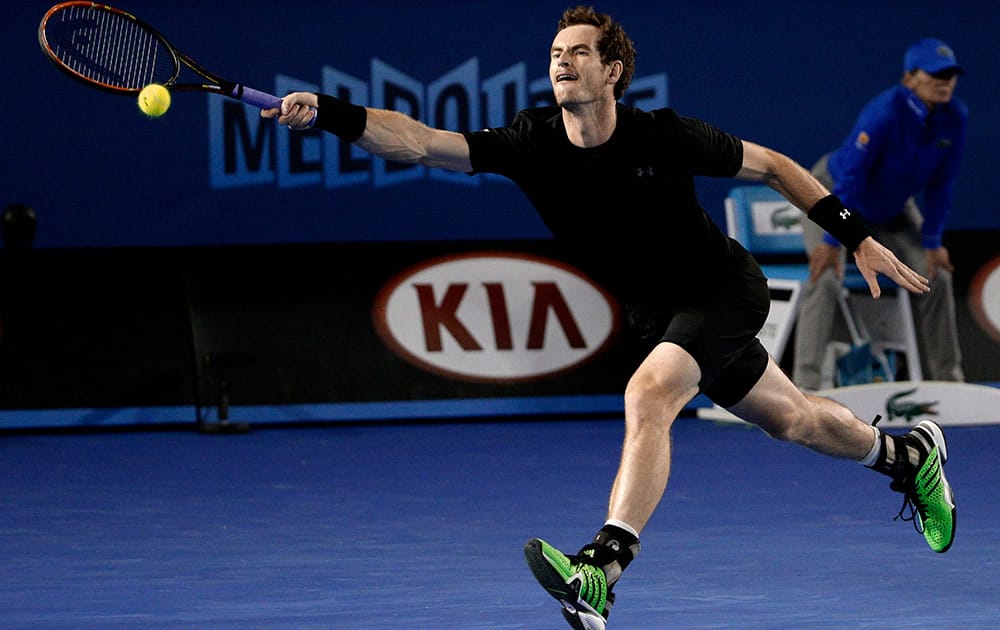 Andy Murray of Britain chases down a shot to Novak Djokovic of Serbia during the men's singles final at the Australian Open tennis championship in Melbourne, Australia, Sunday.