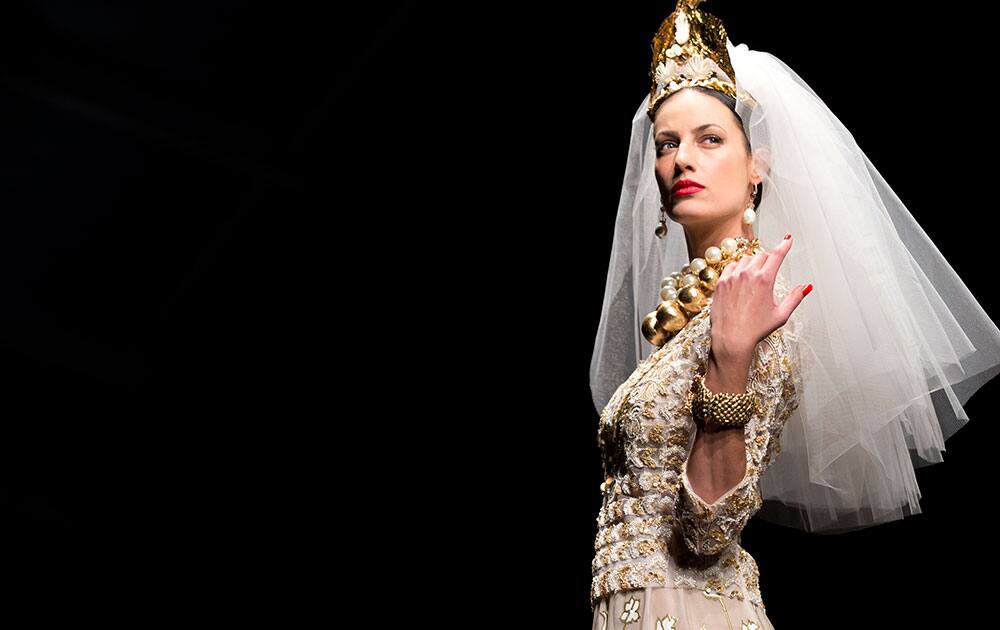 A models wears a creation part of Italian fashion house Curiel Spring-Summer 2015 high fashion collection, unveiled in Rome.