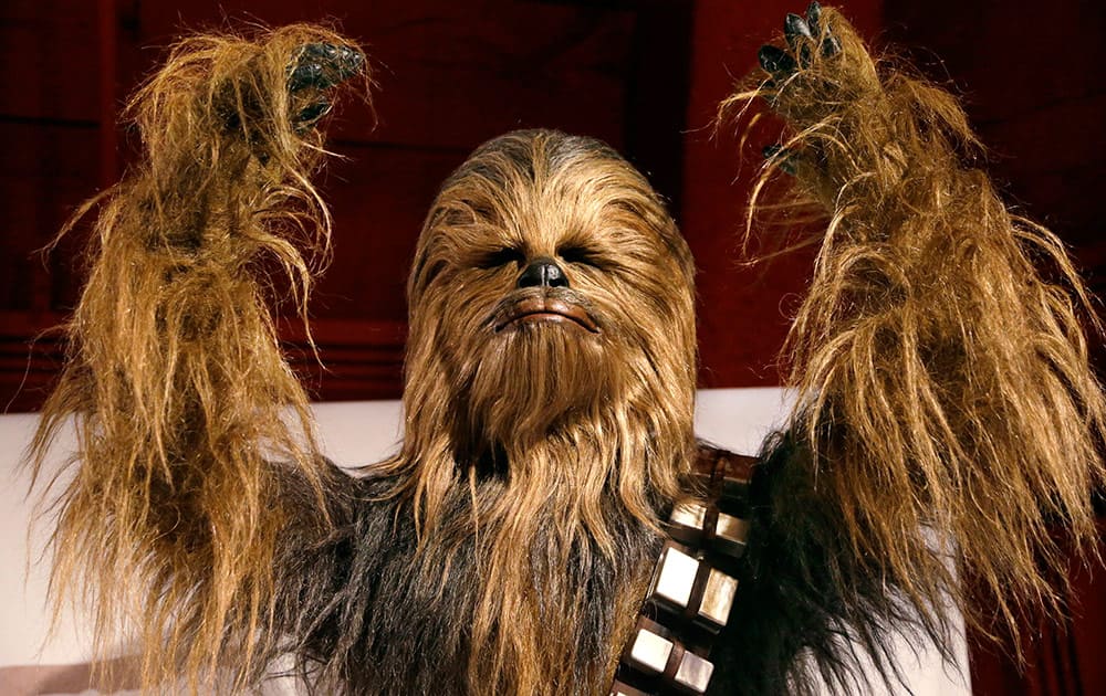 A yak hair and mohair costume of the Wookiee Chewbacca is displayed as part of an exhibit on the costumes of Star Wars at Seattle’s EMP Museum.