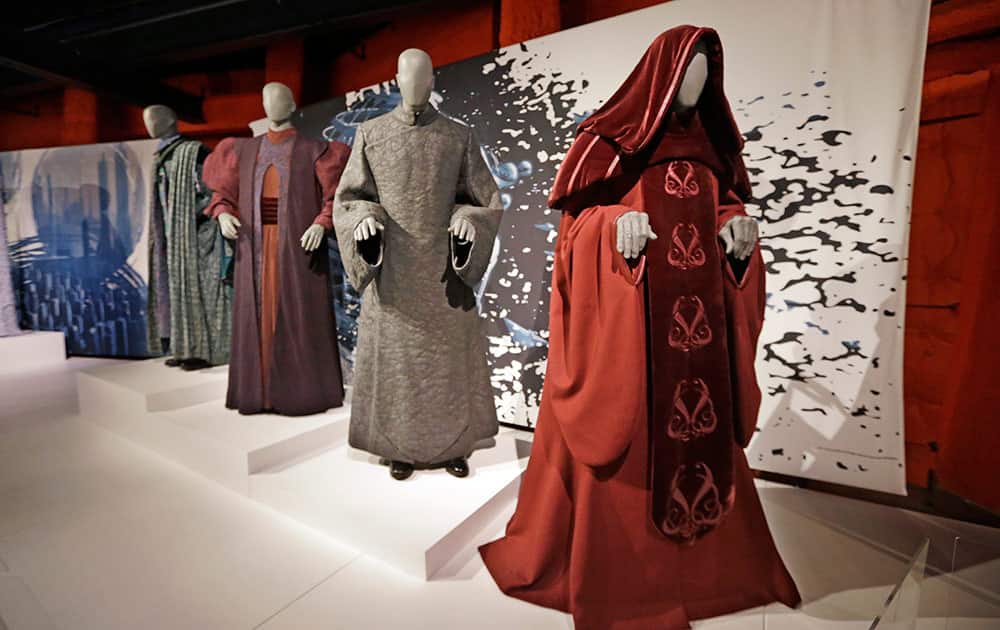 Senate and Trade Federation robes are displayed as part of an exhibit on the costumes of Star Wars at Seattle’s EMP Museum.