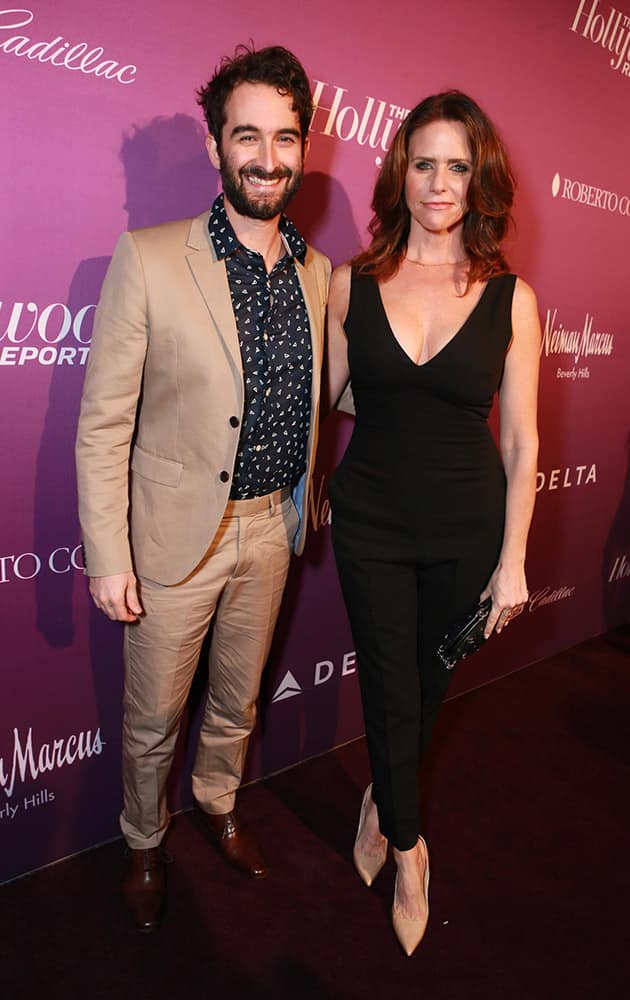 Jay Duplass, left, and Amy Landecker arrive at The Hollywood Reporter Nominees Night presented by Cadillac, with Delta, Roberto Coin, and Neiman Marcus Beverly Hills at Spago.