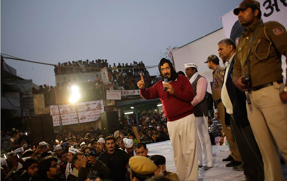 Aam Aadmi Party leader Arvind Kejriwal addresses an election rally in New Delhi.